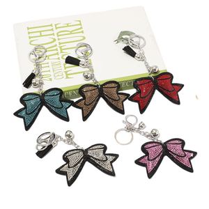 Porte-clés <span class=keywords><strong>en</strong></span> cristal <span class=keywords><strong>en</strong></span> forme de nœud papillon avec motif léopard, avec pompon et anneau <span class=keywords><strong>en</strong></span> métal, <span class=keywords><strong>prix</strong></span> de gros, accessoires pour clés - Product Image 2