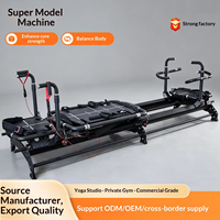 Machine de Pilates professionnelle en aluminium noir avec chariot coulissant pour amincissement et programmes de mise en forme en studio pour femmes