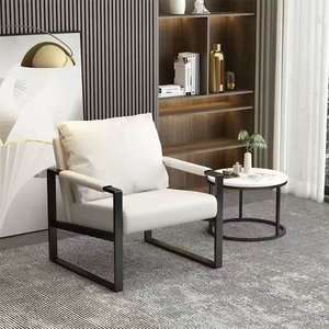 Sofá Minimalista Ergonómico GQK Nórdico Ligero de Una Plaza en Cuero Sintético con Estructura Metálica para Tienda de Ropa Online - Product Image 4