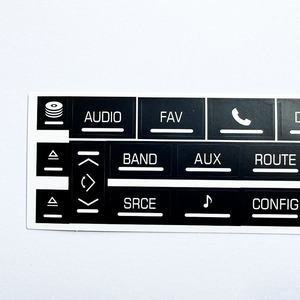 Autocollant de réparation de bouton rectangulaire réutilisable en PVC noir pour commandes audio multimédias Cadillac 2007-2014 - Product Image 1