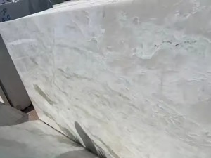 แผ่นหินอ่อนโอนิกซ์สีขาวหินธรรมชาติที่สง่างามสำหรับปูผนังและปูพื้นในโครงการที่พักอาศัย - Product Image 4