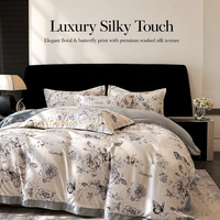 Parure de lit 4 pièces en fibre de polyester 100 % lavée effet soie, motif floral papillon, avec bordure large contrastante, housse de couette et draps en satin romantique