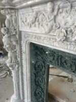 2025 Usine Fait À La Main Naturel Blanc Carrare Marbre Cheminée avec Marbre Vert Cadre Intérieur Statue Unique Statuaire Décor À La Maison