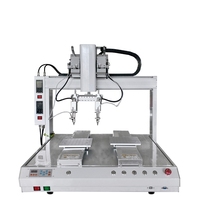 Machine de soudage de circuits imprimés de bureau 4 axes, double tête, rotation sur axe R, gabarit de serrage universel, système d'alimentation automatique en étain, double plateforme