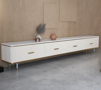 Table basse et meuble TV modernes de luxe avec plateau en marbre et rangement en acier inoxydable pour salon et chambre