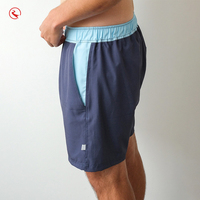 Nouveaux shorts de bain pour hommes bleu marine avec fentes latérales, bordure aqua et cordon de serrage, pour l'été et le surf