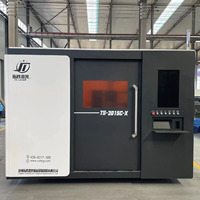 Machine de découpe laser CNC Tuosheng avec table d'échange, équipement de découpe laser à fibre entièrement fermé pour la vente