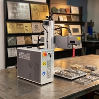 Mesin Penanda Laser 3D Dynamic Focus JPT MOPA 100W untuk Pengukiran Laser pada Permukaan Batu Melengkung dan Bulat dengan Relief Cetakan Logam