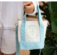 Sac fourre-tout réutilisable en toile de coton avec poche et bouton, idéal pour les étudiants