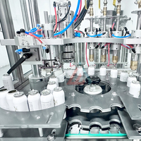 Machine de remplissage et de bouchage automatique pneumatique pour aérosols, pour applications cosmétiques et chimiques