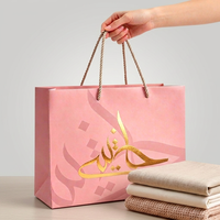 Sacs cadeaux en papier kraft écologiques personnalisés de luxe, sacs d'emballage pour boutiques de détail, sacs en papier pour vêtements de couleur rose
