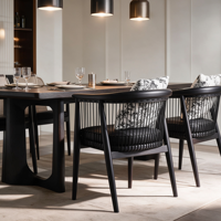 Chaise de salle à manger en bois massif de style italien, dossier rembourré en cuir noir, siège d'appoint moderne minimaliste haut de gamme pour salon