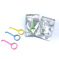 Outil de retrait d'aligneurs orthodontiques invisibles en plastique coloré, emballage individuel
