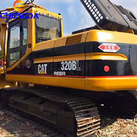 Excavatrice hydraulique Caterpillar CAT 320BL d'occasion, moteur diesel puissant, engin de construction en stock