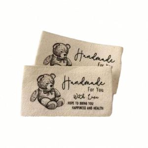Etiquetas Tejidas de Algodón Personalizadas al por Mayor, MOQ Bajo de 100 Piezas, Etiquetas para Ropa - Product Image 5