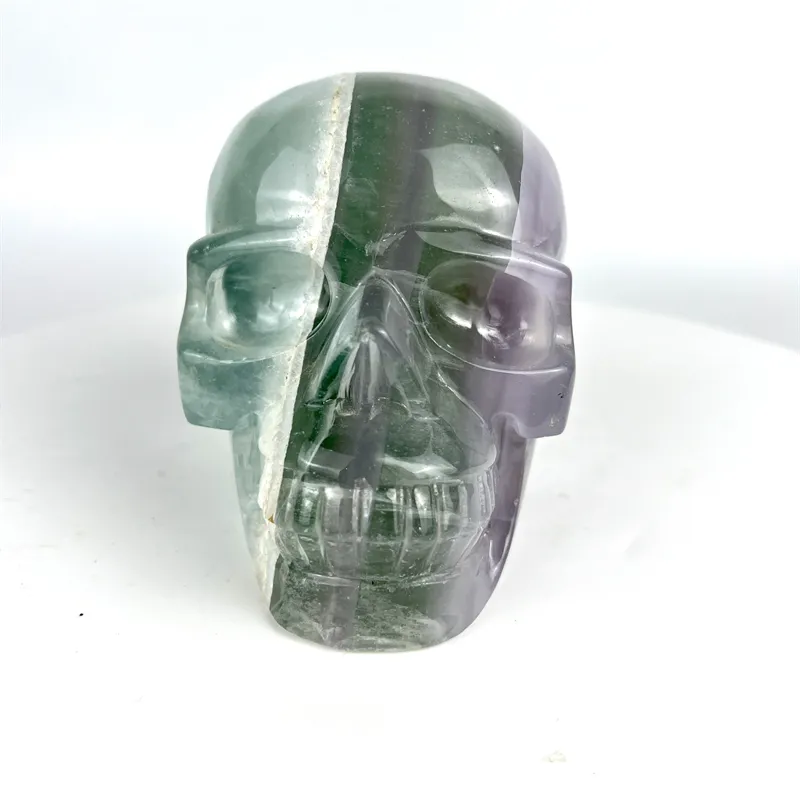 Cabeza de calavera de cristal de cuarzo de fluorita verde púrpura amarilla tallada a mano de alta calidad Natural al por mayor para decoración del hogar