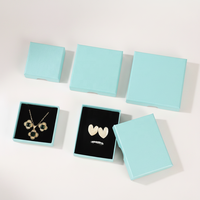 Boîte à bijoux en carton rigide, artisanat d'atelier architectural de signature, étui bleu raffiné, suite de présentation et d'archives