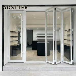 <span class=keywords><strong>Porte</strong></span> pliante AOSTTER en aluminium finition noire minimaliste avec panneau <span class=keywords><strong>de</strong></span> sécurité haute transparence et <span class=keywords><strong>seuil</strong></span> encastré pour villa contemporaine - Product Image 1