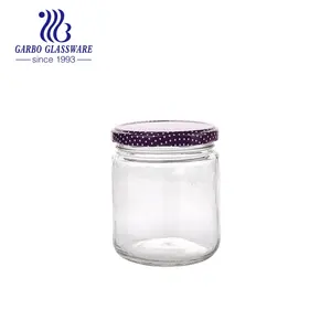 Round Shape Glass Jar com Lid Garrafa De Armazenamento Transparente para Candy Sugar Kitchen Seasoning Jar Preço por atacado Garrafa De Vidro