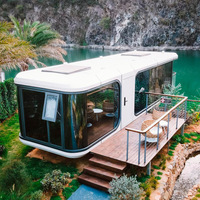 Chambre d'hôtel préfabriquée de luxe moderne en acier, style capsule spatiale futuriste, X7, avec fenêtres panoramiques en verre et balcon en bois, pour complexe hôtelier