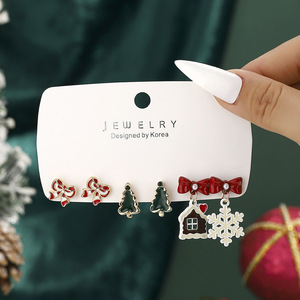Cross-border new Christmas wind earrings European and American wind Christmas <b>tree</b> bow snowhouse snowflake personality earrings - Product Image 1