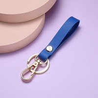 Großhandel Hochwertiger Modischer Leder-Schlüsselanhänger Bunter Individueller Logo PU Blanko-Leder Metallring Schlüsselanhänger
