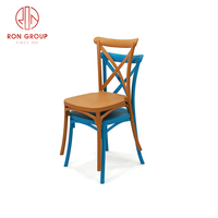 Nouvelle bonne qualité dos croisé Orange bleu PP résine meubles de salle à manger de mariage hôtel moderne chaise en plastique pour les événements
