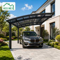 Abri de voiture double gris minimaliste moderne, structure en aluminium électrophorétique anti-corrosion, pour maisons de luxe, OEM ODM, auvent multifonctionnel