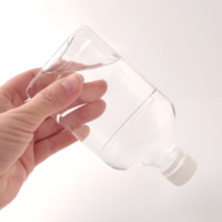 Bouteille plate transparente de boisson alcoolisée en plastique PET de qualité alimentaire de 200ml avec bouchon inviolable blanc