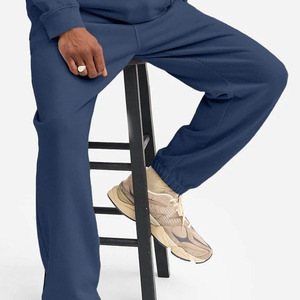 Pantalon de jogging ample pour homme, coupe décontractée, idéal pour les entraînements, les séances de sport et le quotidien, en molleton de coton respirant de haute qualité. - Product Image 2
