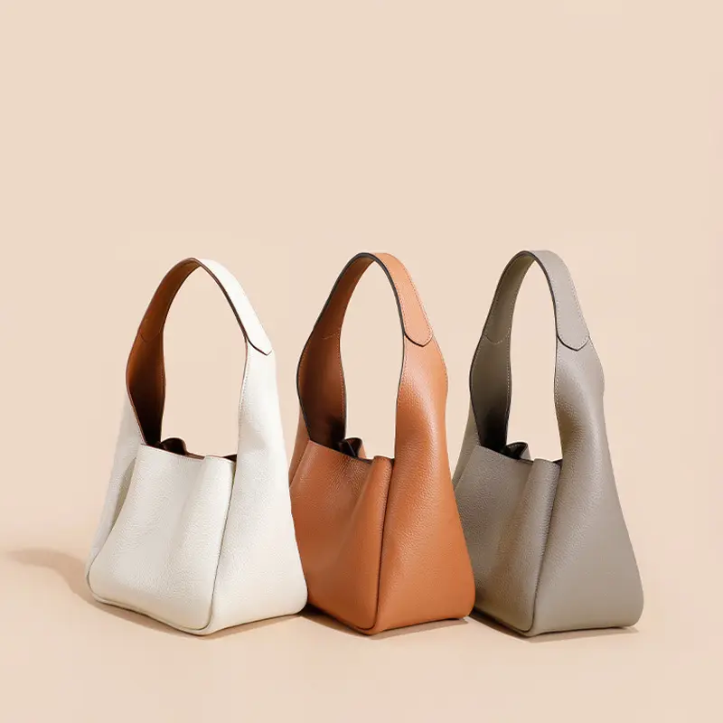 2024 yeni tasarımcı çantaları üretici toptan özel bayanlar high-end hakiki deri kadın koltukaltı omuz kova çanta