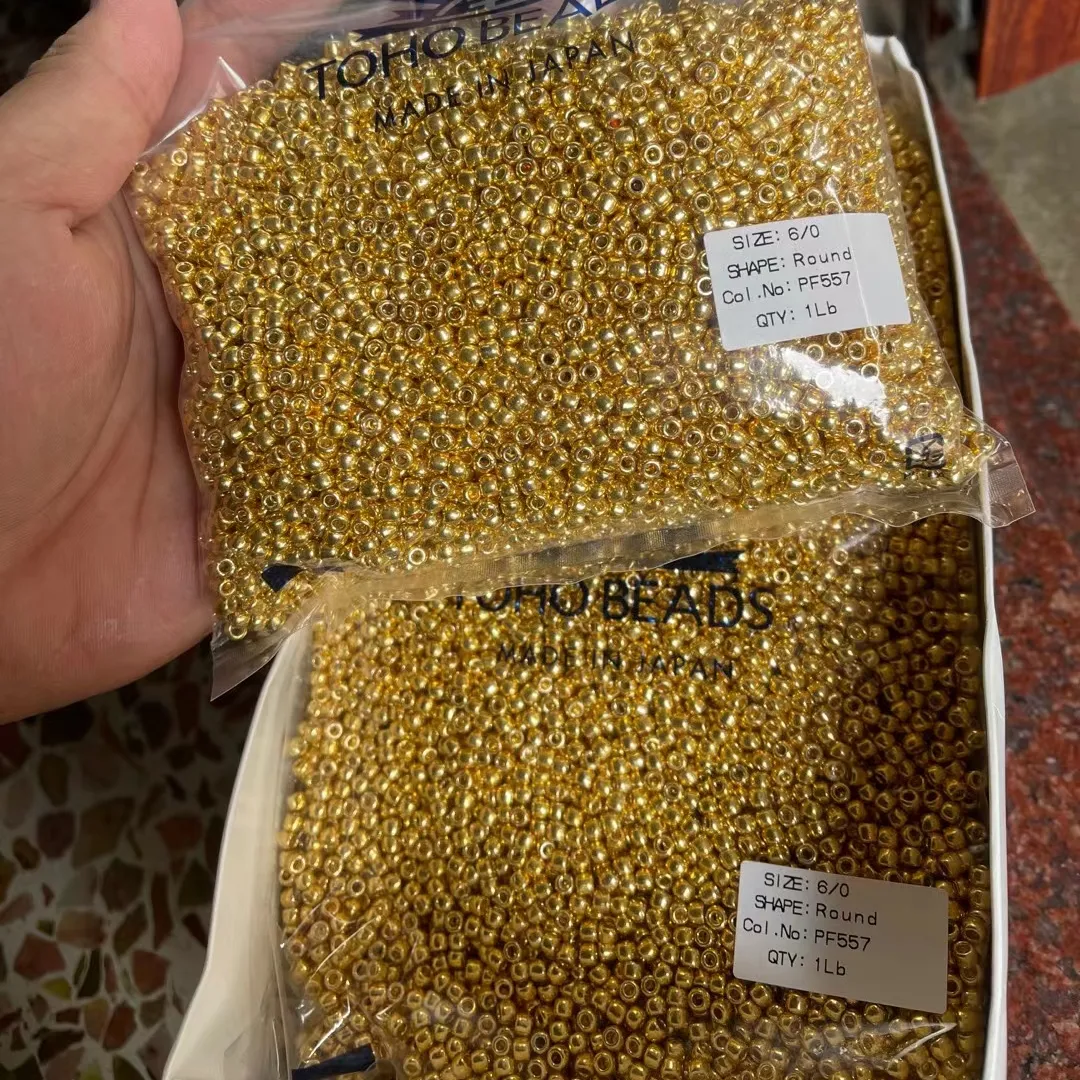 Commercio all'ingrosso 450 grammi di perline di vetro TOHO originale giapponese di qualità eccellente PF557 PF558 mini perline di semi per la creazione di gioielli