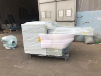 Coupe-fibres industriel à mouvement alternatif avec grande bouche d'alimentation pour la découpe de déchets textiles en vrac