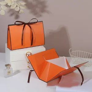 JuYi Luxury Folding Creative Skin care cosmetics Silk scarf Triangle Orange Paper Handle Small Gift Bag with ribbon Closure