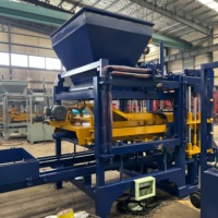 Formeuse hydraulique de béton QT4-15B pour ateliers de matériaux de construction produisant des unités de maçonnerie et des produits de pavage