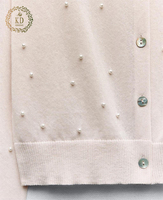 KD fabrication de tricot personnalisé OEM ODM Designer Polo simple col coquille boutons fausses perles tricots femmes Cardigan pull