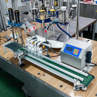 Remplisseuse automatique de liquide à 4 têtes avec ligne de convoyeur pour la mise en bouteille de vin, de sauce soja et d'alcool