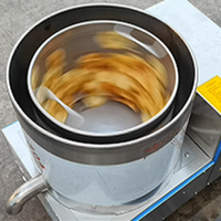 Machine centrifugeuse en acier inoxydable pour l'égouttage et la déshydratation des frites, des chips et des aliments frits