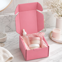 Boîtes d'expédition en carton ondulé rose solide avec revêtement UV recyclable pour l'emballage de cosmétiques et de soins de la peau de luxe