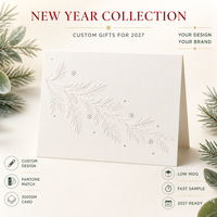 Carte de vœux personnalisée en papier coton blanc hiver 2027, gaufrée à chaud avec motif branche de pin et feuille d'argent, impression logo OEM