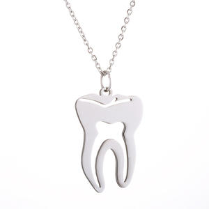 Mặt dây chuyền răng giả bằng thép không gỉ mạ vàng cổ điển, kiểu dáng rỗng, kèm dây xích, làm quà lưu niệm kỷ niệm. - Product Image 4