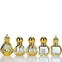 Flacon de parfum à bille en verre gravé électro-plaqué or de luxe, forme unique, style Dubaï, 10 ml 15 ml, avec bouchon couronne doré