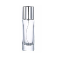 Bouteille de parfum en verre transparente cylindrique de 20ml mini capacité portionnement bouteille de parfum en verre vide avec pulvérisateur à pompe vente en gros