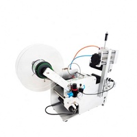 Machine d'étiquetage de bouteilles rondes pneumatique semi-automatique à fonctionnement facile pour les boissons