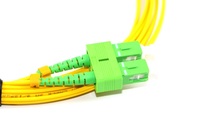 Kabel Patch Fiber Optik Berkualitas Tinggi Sampel Gratis Pabrik XXD Kuning 2.0mm 3.0mm OEM2 SC-LC UPC/APC Duplex Jumper untuk FTTH