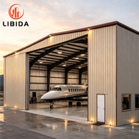 Hangar d'avion en structure d'acier préfabriquée, bâtiment en acier préfabriqué résistant au vent et à la neige pour le stockage de jets et l'entretien des avions