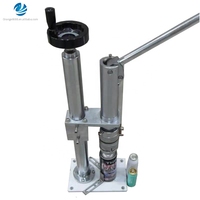 Machine de remplissage et de sertissage d'aérosols pour petits espaces, type Bag-on-Valve, 1 machine de remplissage d'aérosols