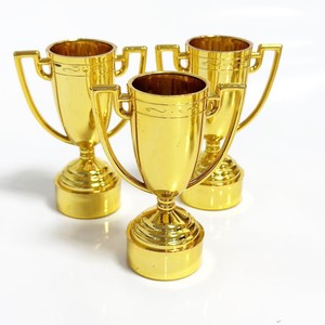 Little Golden <b>Cup</b> Plastic <b>Trophy</b> Awards Business Gifts Durable Digital Printing Logo Customizable - Product Image 1