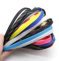 Le protecteur de gestion des câbles couvre le manchon tressé en polyester anti-morsure manchon tressé extensible pour animaux de compagnie