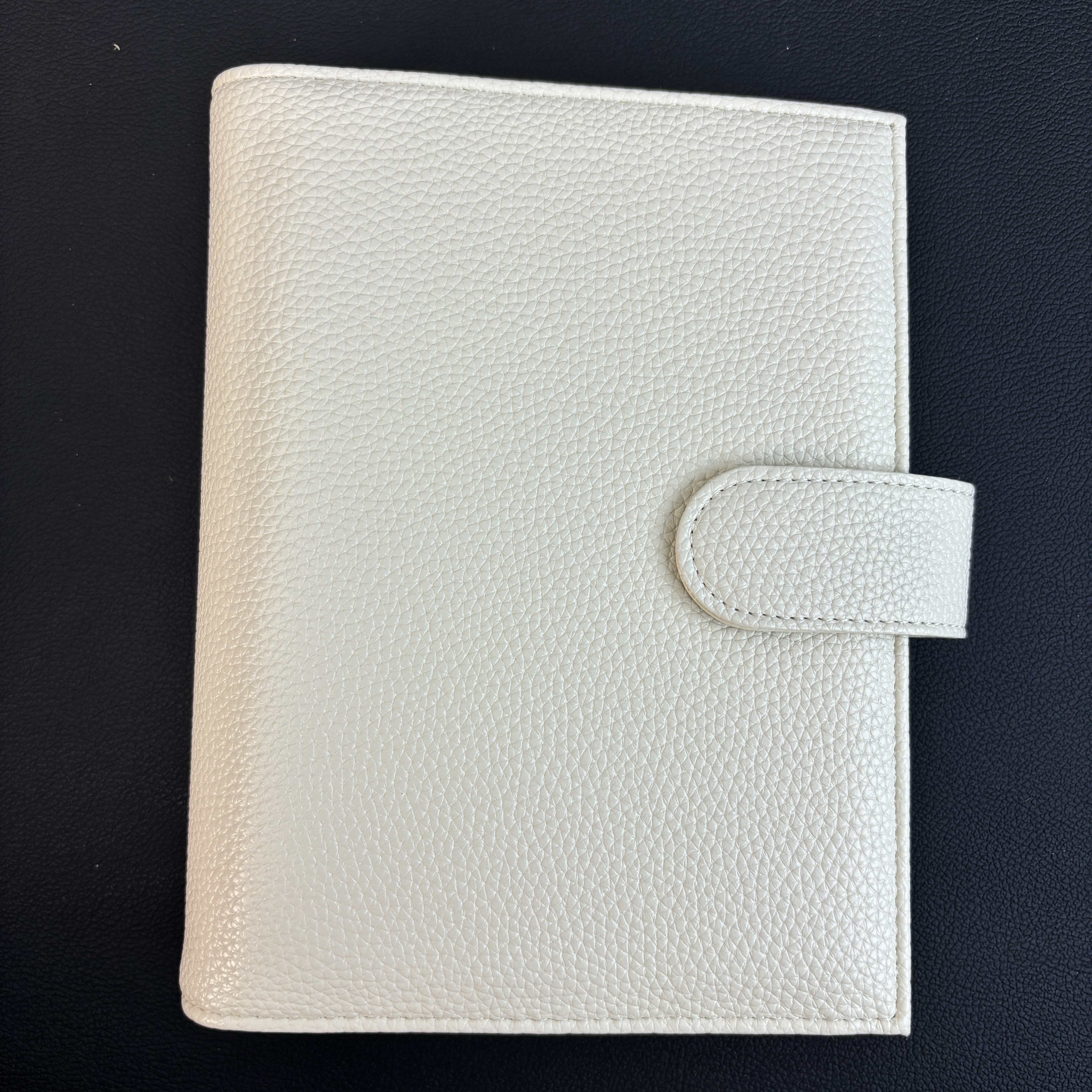 Couverture de galets beige